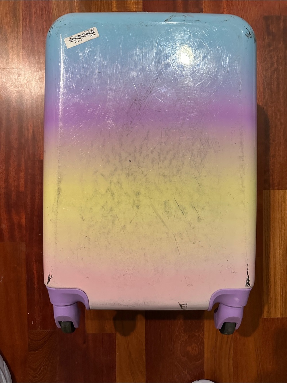 Target Kids Pastel Gradient Rolling Suitcase in Blue, Purple, Yellow, Pink
